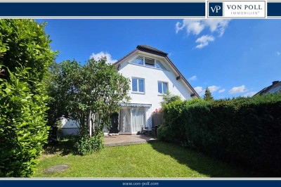 A-Lage mit Fernblick: Top gepflegtes 2-Familien-Haus mit schönem Garten, 2 Garagen + 2 Stellpl.