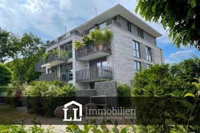 Hochwertige 3-Zimmer-Erdgeschosswohnung mit Terrasse & Tiefgarage.