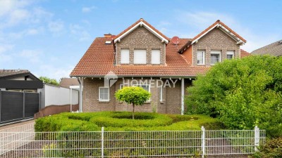 Einziehen & Wohlfühlen! Stets modernisierte DHH mit gepflegter Ausstattung & hübschem Außenbereich