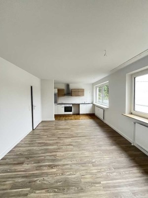 Single-Wohnung mit großzügigem Wohnzimmer und integrierter Küche!