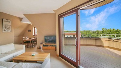 Dachgeschosswohnung mit großer Terrasse in zentraler Lage