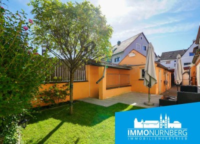 Wie für Familien gemacht: Haus mit Innenhof, Hobbybereich und Garten