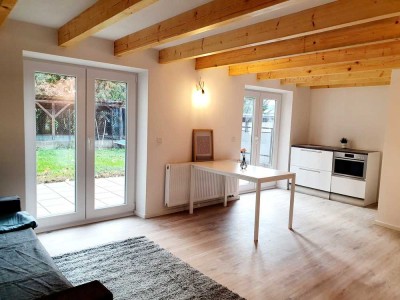 Einzigartige 2-Zimmer-Wohnung mit Gartenzugang