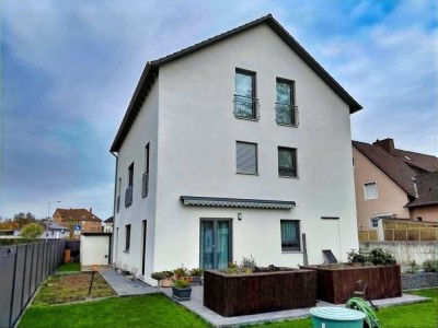 Sarstedt: Neuwertige KFW 55-Wohnung im EG mit Terrasse und Keller