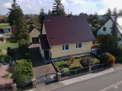 Gepflegtes Einfamilienhaus mit Gartenparadies und vielseitigen Nutzungsmöglichkeiten