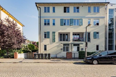 Familiengerechte 4,5-Zi. Maisonette-Wohnung mit großzügigem eigenen Garten und Tiefgarage!