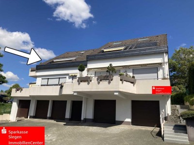 Dachgeschosswohnung mit Südbalkon und besonders großer Garage