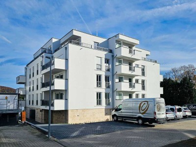Neubau Erstbezug, exklusive 2-Zimmer- Wohnung mit Pkw-Außenstellplatz in direkter Rheinlage