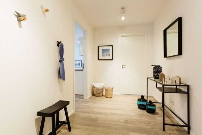 Moderne Zwei Zimmer Erdgeschosswohnung, Barrierearm, kleine Terrasse, Tiefgarage, eigene E-Ladesäule