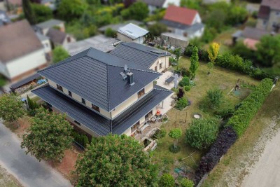 Sofort wohlfühlen: 9-Zi.-EFH mit zusätzlichem Bungalow und Pkw-Garage im ruhigen Fürstenwalde/Spree