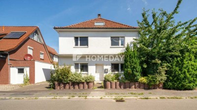 Zwei Einheiten, ein Eigentum – voll vermietetes Anlageobjekt mit Gartenanteil & Terrasse in Grohn