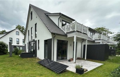 Moderner Wohntraum im Grünen - Stillvolle Eigentumswohnung mit Garten
