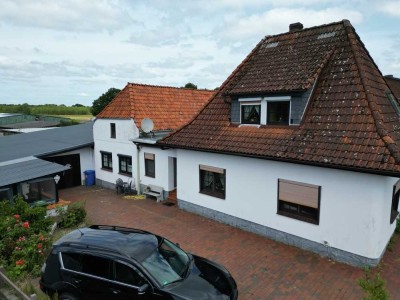 Raum für Leben und Visionen: Wohnhaus mit Werkstatt, Wellnessbad und inspirierender Atmosphäre