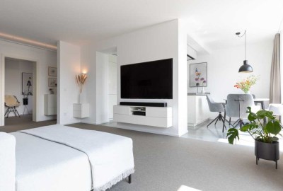 Design trifft Alpenpanorama – stilvolle Gartenwohnung in Bestlage von Brannenburg