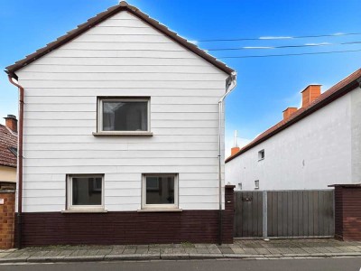 Charmantes Einfamilienhaus mit großzügigem Garten und Garage in ruhiger Lage von LU-Rheingönheim