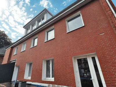 Neubau-Dachgeschosswohnung im charmantem Bestandshaus
