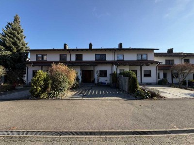 Charmantes Reihenmittelhaus mit Einliegerwohnung, Doppelgarage und Garten in ruhiger Wohnlage