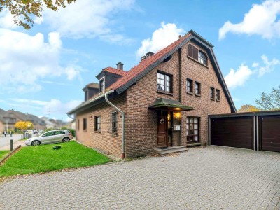 Sehr gepflegte Doppelhaushälfte mit idyllischen Garten und Doppel Garage in Moers-Holderberg