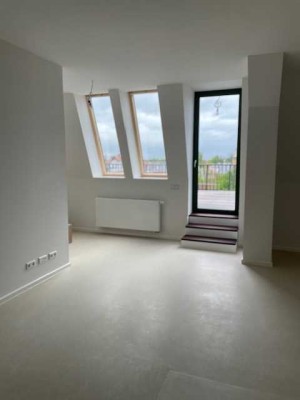 Dachgeschosswohnung mit Terrasse im alten Postgebäude