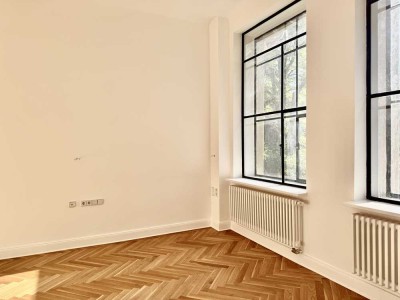 loftähnliche Wohnung mit Grünblick im sanierten Denkmal * Erstbezug *