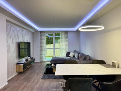 EIGENGARTEN: Modernisierte 2-Zimmer-Wohnung mit Tiefgarage und großem Kellerabteil