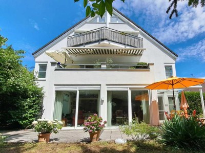 Komfortable EG-Wohnung - eigener Garten und 2 TG-Stellplätze!