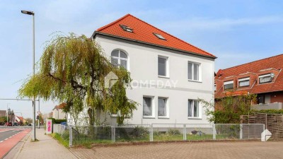 Attraktive Investitionsmöglichkeit: Mehrfamilienhaus mit 3 Wohneinheiten und Garten