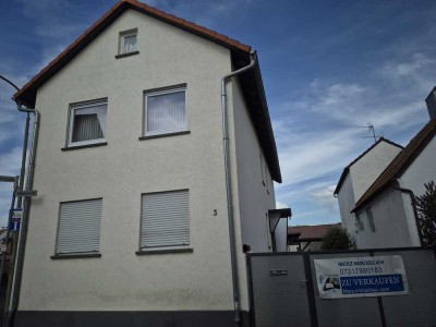 Haus mit Werkstatt und Unterstellplatz