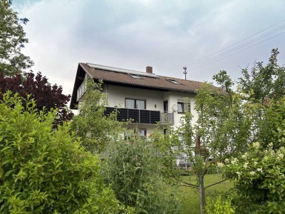 Vermietete 4 Zimmer-Eigentumswohnung mit Balkon + Garage