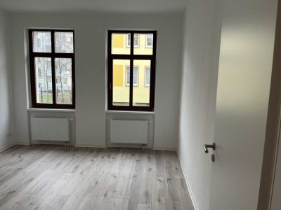 Erstbezug nach Sanierung! perspektivisch mit Balkon: Ansprechende 2,5-Raum-EG-Wohnung in Leipzig