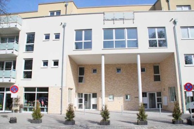 Hochwertige Mietwohnung mit 2 Zimmern,  großer Terrasse und eigenem Gartenanteil