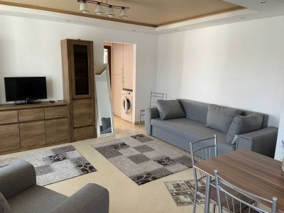 Attraktive und modernisierte 2-Zimmer-Dachgeschosswohnung mit geh. Innenausstattung mit EBK in Diez