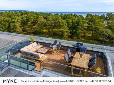 Ferienimmobilie in Miteigentum: Penthouse in erster Meereslinie mit Dachterrasse, Sauna und Pool