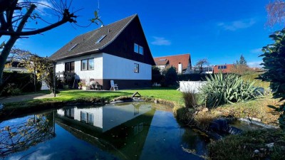 Gepflegtes Zweifamilienhaus mit Pool, Carport & großem Garten in 77977 Rust