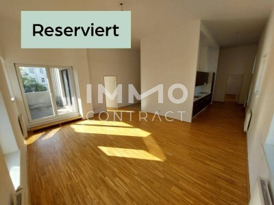 RESERVIERT! Große Dachgeschosswohnung mit traumhafter Loggia im Zentrum