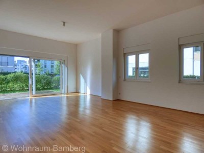 Moderne Erdgeschosswohnung mit sonniger Terrasse, eigenem Grünbereich und komfortablem Aufzug zur TG