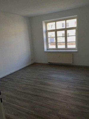 1 Zimmerwohnung mit Wohnküche, Tageslichtbad und Wanne