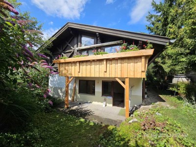 2-Zimmer-Wohnung mit überdachter Terrasse und eigenem Garten