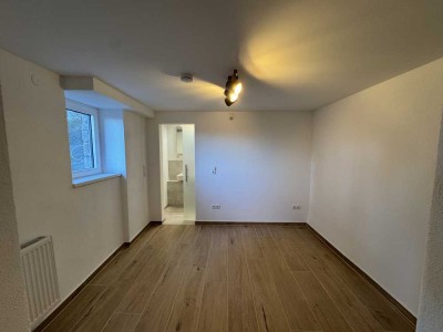 Charmante, frisch sanierte Wohnung mit großer Terrasse und Gartennutzung in guter Wohnlage in WR