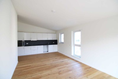 Traumhaftes Penthouse mit hohen Decken, großem Balkon, EBK und TG-Wallbox - sehr sehenswert!