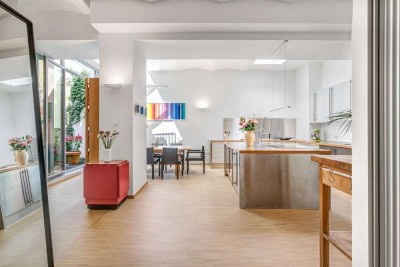 Lichtdurchflutete Gartenwohnung im Loft-Stil. Ruhige, grüne Innenhoflage.