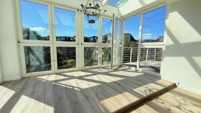 IM WINTERGARTEN ÜBER DEN DÄCHERN VON OTTENSEN