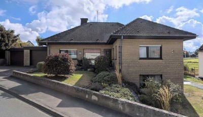 Großer Bungalow mit Einliegerwohnung in ruhiger Lage