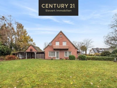 Einfamilienhaus mit Garage und großem Grundstück