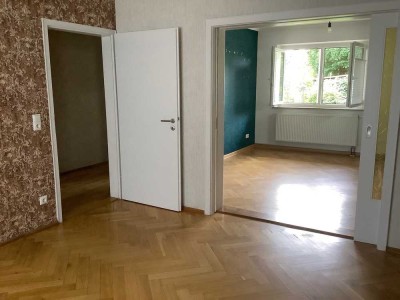 Einfamilienhaus-Doppelhaushälfte mit schönem Garten,  Fernblick und geräumiger Garage