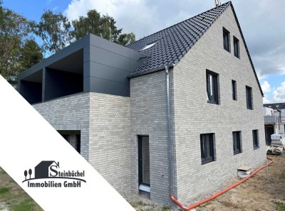 Modernes Wohnen im Grünen! Großzügige Neubauwohnung mit Garten und 6,5 Zimmern!