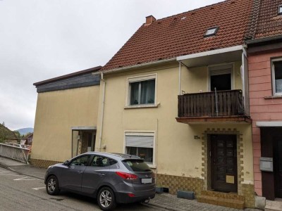 Zweifamilienhaus mit Grundstück (vermietet)