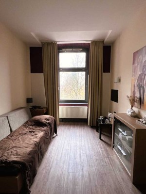 Wertanlage ERBA-Insel: vermietete, hell möblierte Studentenwohnung mit Blick ins Grüne