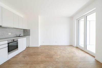 Lichtdurchflutete Wohlfühloase mit Balkon, moderner Einbauküche und großzügigem Wohnambiente