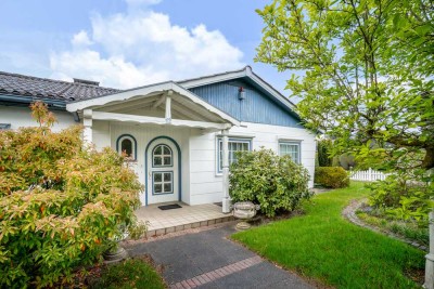 Charmanter Bungalow mit viel Potential und großem Gartenparadies: Wohnen im grünen Ellerbek